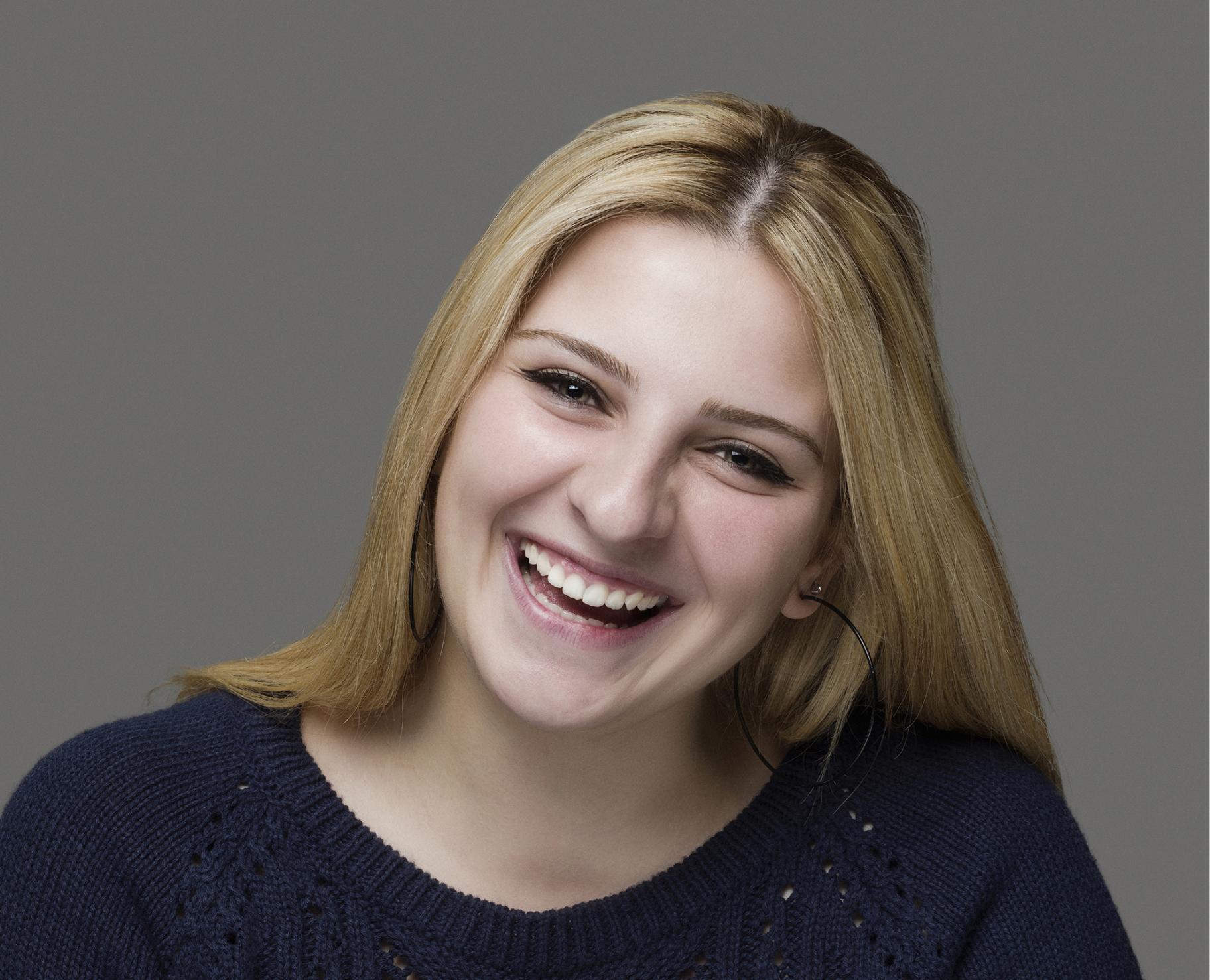 Headshot portraits of diverse smiling people